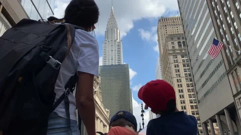 Young mother with two children visiting new york manhattan Stock Footage 228293086