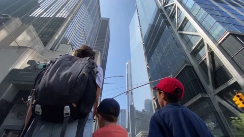 Young mother with two children visiting new york manhattan Stock Footage 228303038