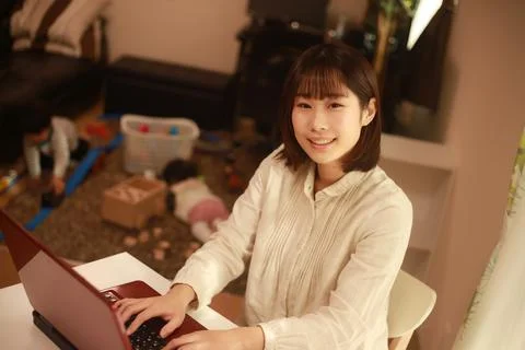 Young mother using a computer Stock Photos