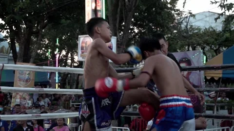 Young Muay Thai boxers are fighting each other, slow motion. Stock Footage 262010601