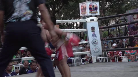 Young Muay Thai boxers are fighting each other. Stock Footage 262015078