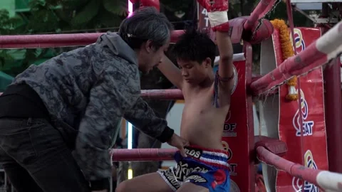 Young Muay Thai boxers are fighting each other, slow motion. Stock Footage 262033508