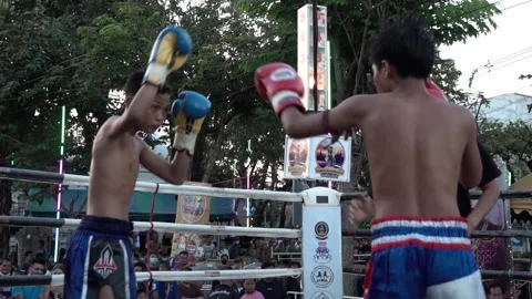 Young Muay Thai boxers are fighting each other, slow motion. Stock Footage 262040780