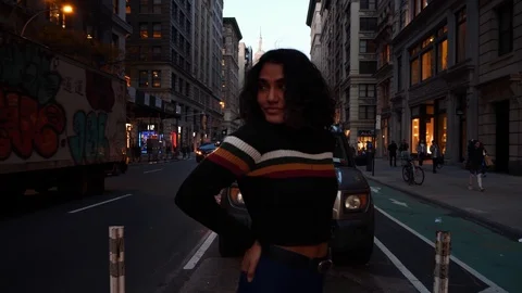 Young multi-ethnic hispanic millennial female on New York city street.  Stock Footage 122531460