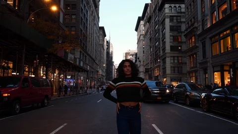 Young multi-ethnic hispanic millennial female on New York city street.  Stock Footage 122531861