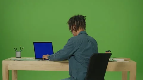 Young Multicultural Freelancer Student Typing on Blue Screen Laptop Working Stock Footage 219733292