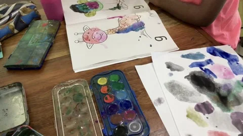 Young Multicultural kindergarten children Painting together. Stock Footage