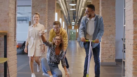 Young Multiethnic Colleagues Having Fun during Workday Stock Footage 126132683