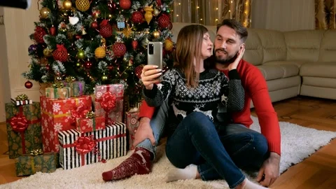 Young multiethnic couple making selfie xmas Stock Footage 165240961