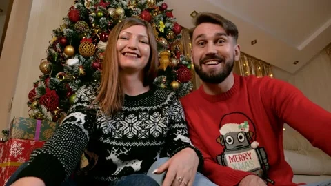 Young multiethnic couple making videocall xmas Stock Footage 165241760