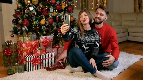 Young multiethnic couple making videocall xmas Video stock 165241982