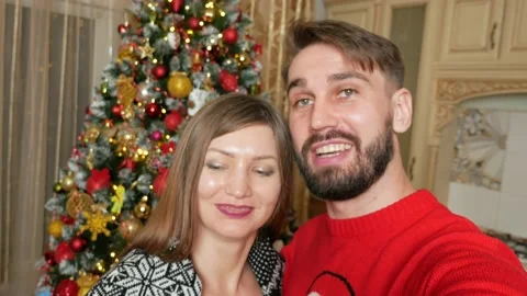 Young multiethnic couple making videocall xmas Stock Footage 165267774