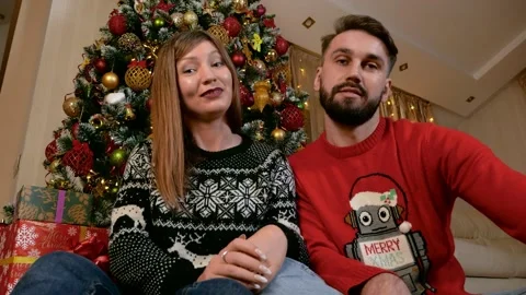 Young multiethnic couple making videocall xmas Stock Footage 218586313