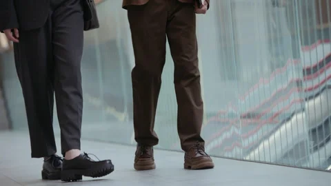 Young Multiethnic Entrepreneurs Chatting during Meeting in Modern Business Space Stock Footage 331798341