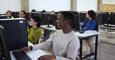 Young multiracial people using computers inside school class at university Stock Footage 168622542