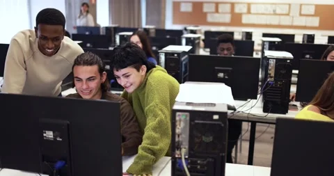 Young multiracial students using computer inside classroom at school Stock-Footage 168622907