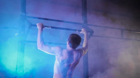 Young muscular athlete doing pull-up exercises Stock Footage 68666137