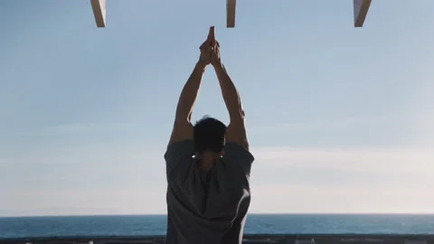 Young muscular man doing stretching outdoor Stock Footage 181088096