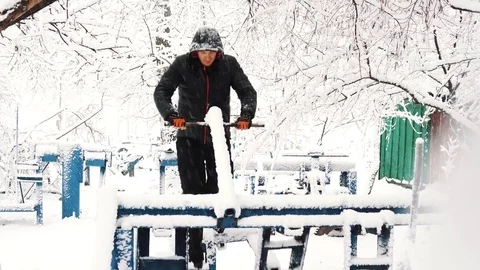 Young muscular man has the training and doing exercise outdoors in winter time. Stock Footage 85366389