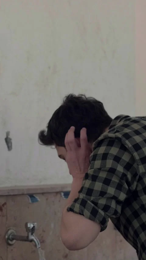 Young Muslim man taking ablution for prayer the mosque Stock Footage 296050157