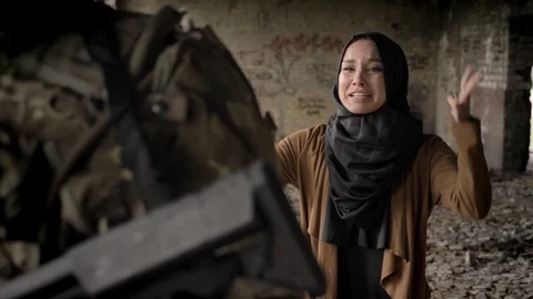 Young muslim woman in hijab screaming an... | Stock Video