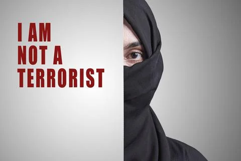 Young muslim women with expressive eyes saying - I am not a terrorist Stock Photos