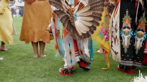 Young Native American Pow-wow dancer taking part in the ceremony Stock Footage