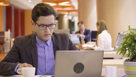 Young nervous man feels stress and pressure because of difficulties and failure Stock Footage