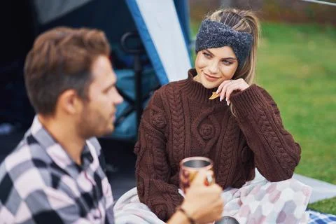 Young nice couple having fun on camping Stock Photos