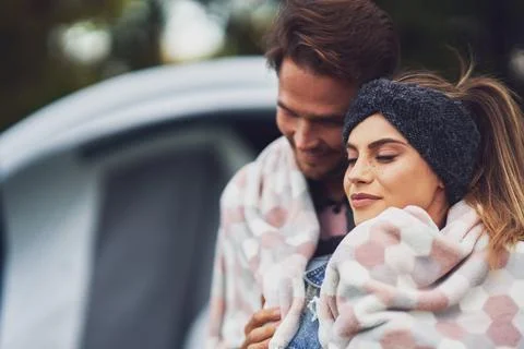 Young nice couple having fun on camping Stock Photos