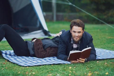 Young nice couple having fun on camping Stock Photos