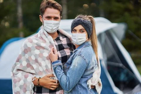 Young nice couple having fun on camping Stock Photos