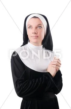 Young nun in religious concept Stock Photos