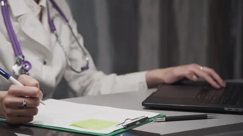 Young nurse spending day at work in office Video stock 119466007