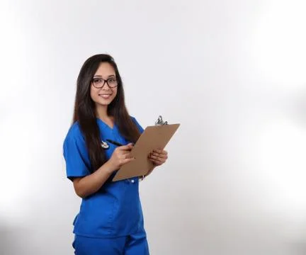 Young Nurse Takes Notes Stock Photos