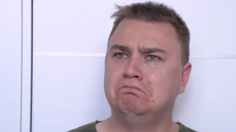 Young offended boy with sad face cries sobbing and sobs plaintively, seizing Stock-Footage 133043464