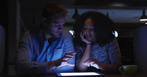 Young office executives working over digital tablet in a modern office Stock Footage 340880905