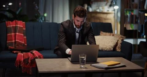 Young office manager man using mobile phone notification reading checking Stock Photos