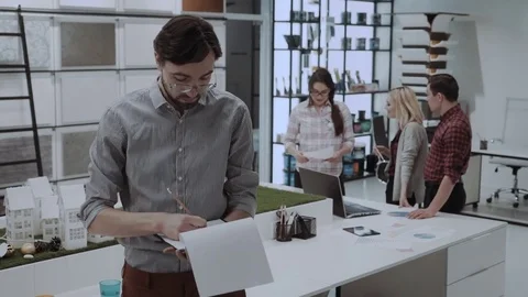 Young office worker in design studio Stock Footage 84726017