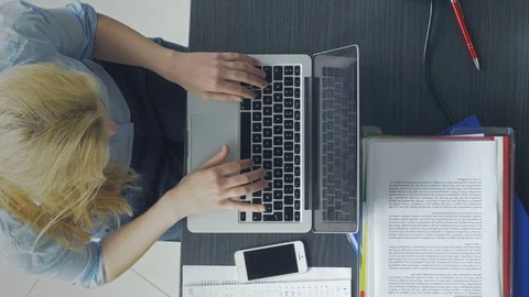 Young office worker managing the new online business Stock Footage 73847628