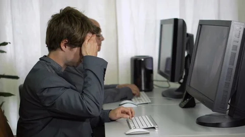 Young Office Worker in Suit Having Headache While Working on Computer Stock Footage 113277170
