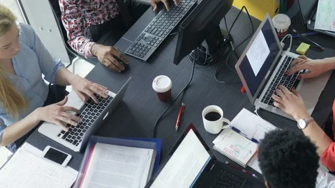 Young office workers managing the new online business Stock Footage 73848377