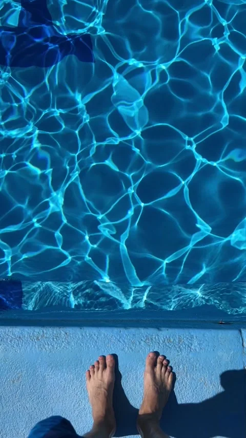 The young one comes to the pool and wants to dive into it Stock Footage 247984907