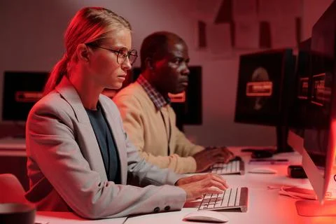 Young operator solving technical problem Stock Photos