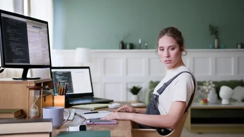 Young overworked freelancer leans back on chair and falls asleep Stock Footage 195415039