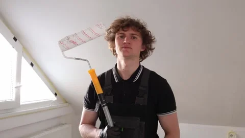Young painter during renovation Stock Footage 335044266