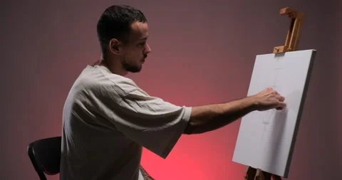 Young painter erase draft of picture 動画素材 233906260