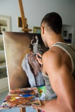 Young painter with her canvas Stock Photos