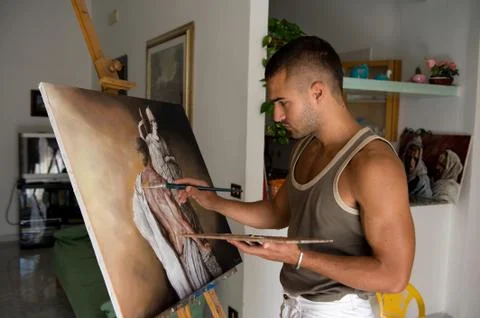 Young painter with her canvas Stock Photos