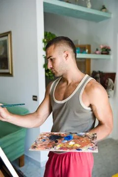 Young painter with his canvas Stock Photos